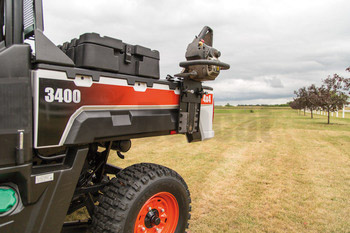 Genuine Bobcat Chainsaw Mount Kit, 7196041, shown installed on a utility vehicle.