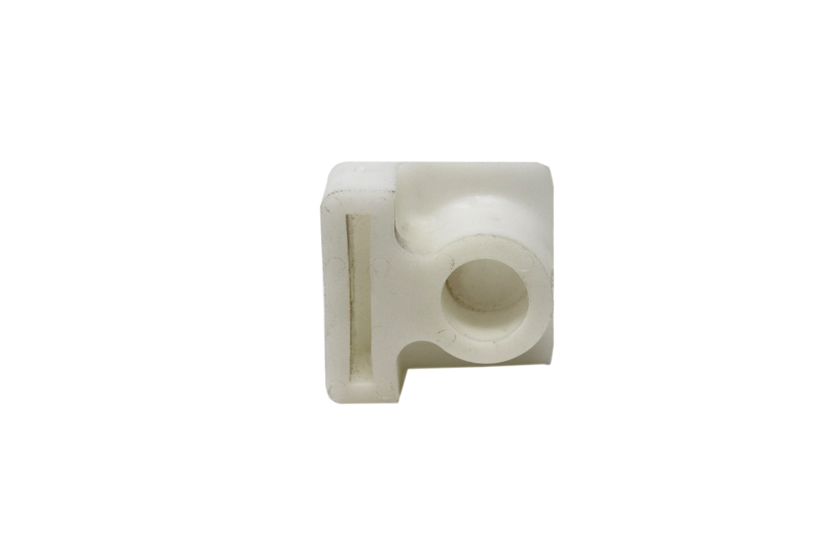Genuine Bobcat Spring Block, 6563148 side view. 