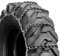Genuine Bobcat Heavy Equipment Tire Chains, 6988530 installed on a tire.